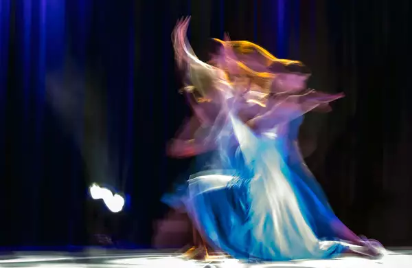 Photograph of two dancers on stage