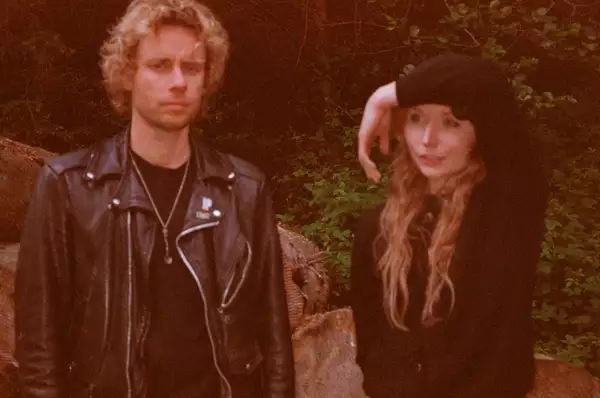 Photo of Sally Mason and Andi stood outside