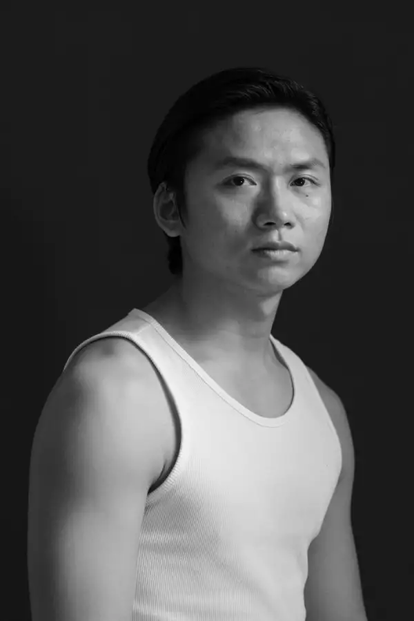 Black and white headshot of Shaoyu WANG