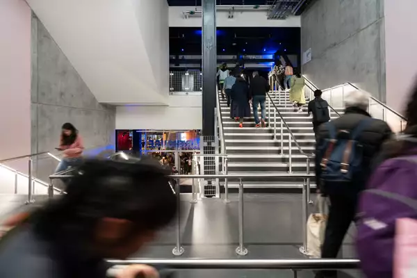 Photo of visitors using the Warehouse staircase