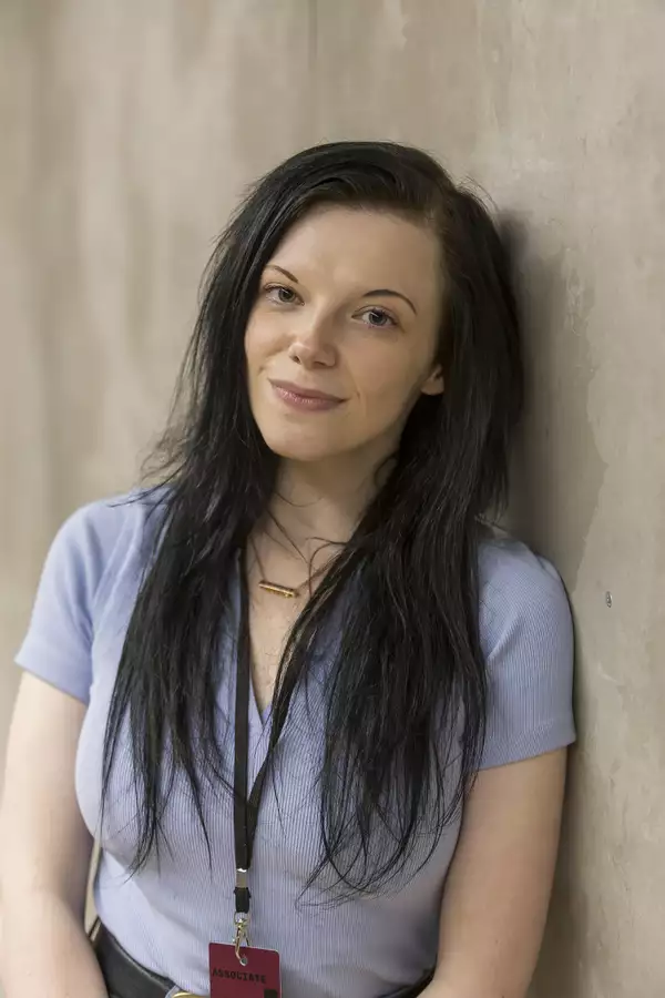 Portrait photograph of Kellie Colbert wearing a light blue top