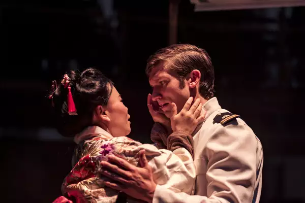 Photo of two people looking into each others' eyes