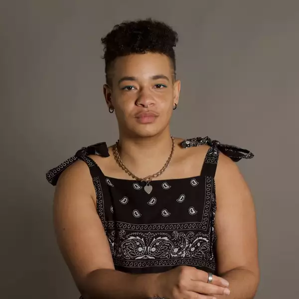 Headshot of Elkanah Wilder on a brown background