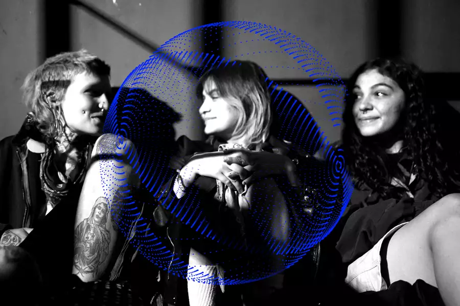 A black and white photograph of three friends