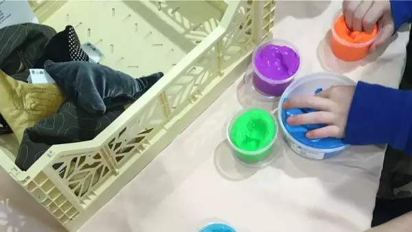 Photo of some art materials and paints on a table