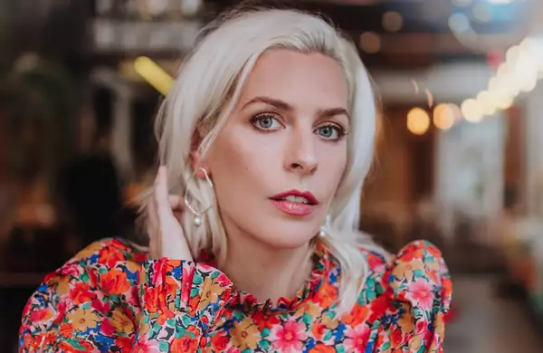 Headshot of Sara Pascoe wearing a floral top