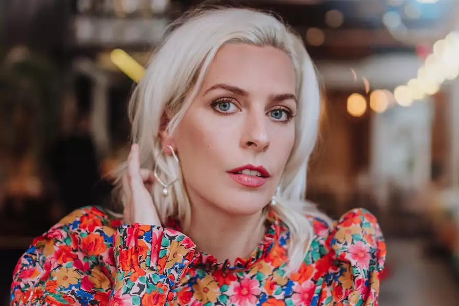 Headshot of Sara Pascoe wearing a floral top
