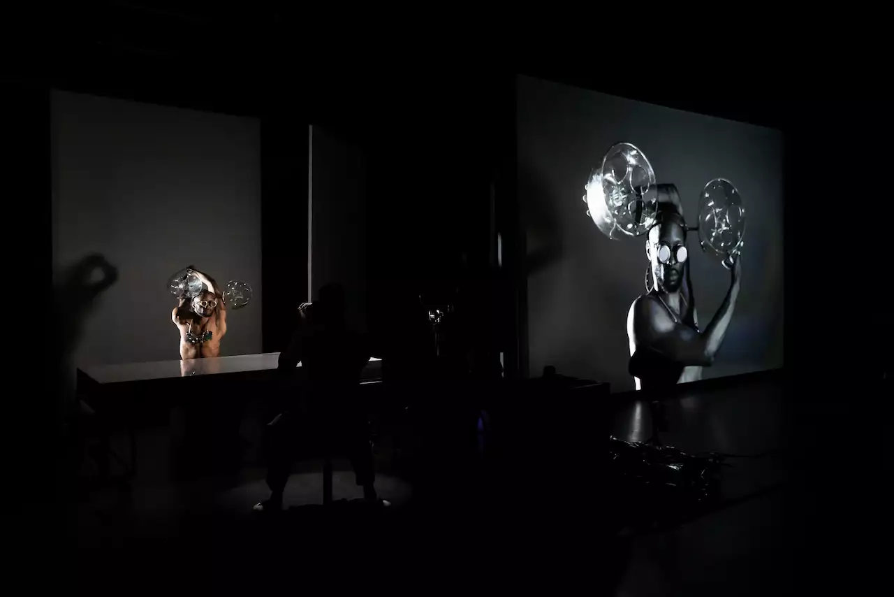 Photo of a model and Benji Reid's live photograph of them