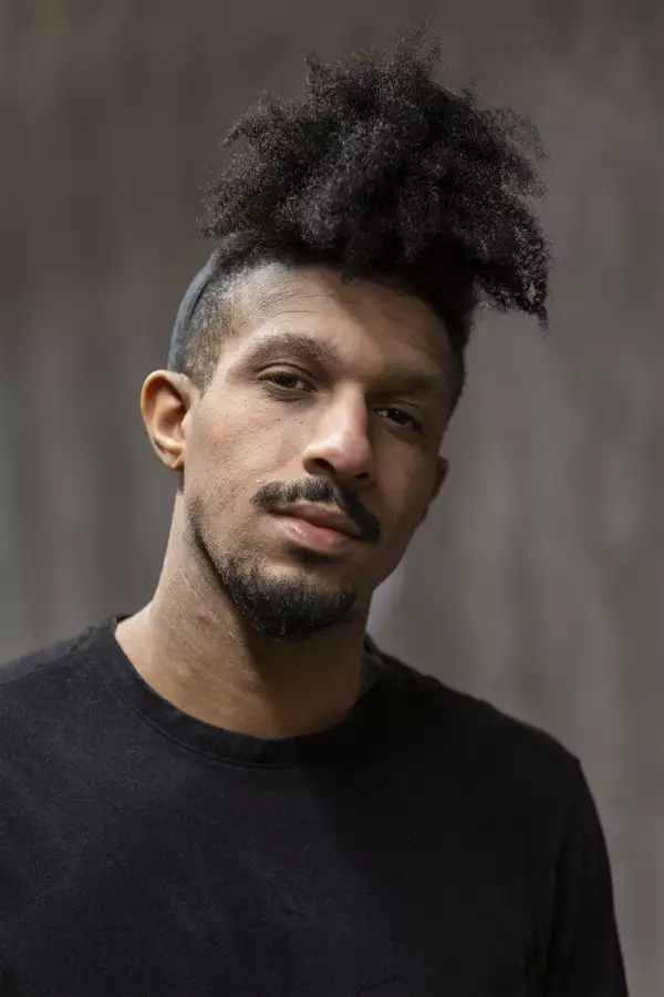 Portrait photograph of Maxi Zee wearing a black top