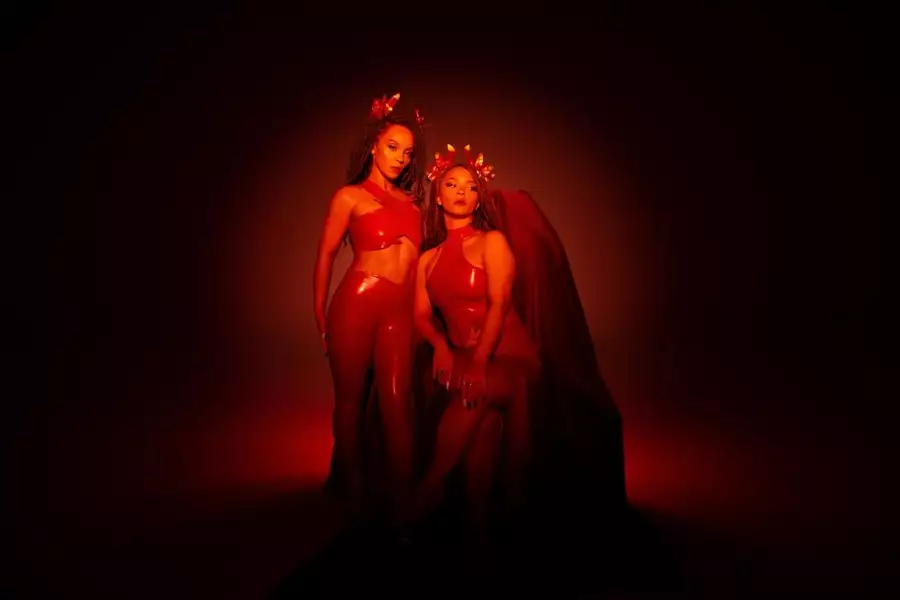 Two piece band the KTNA wear devil inspired outfits