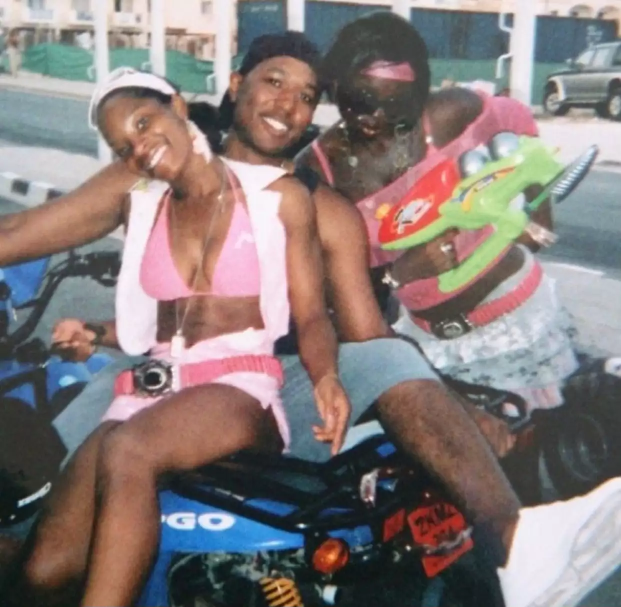 Grainy photograph of three people in Ayia Napa