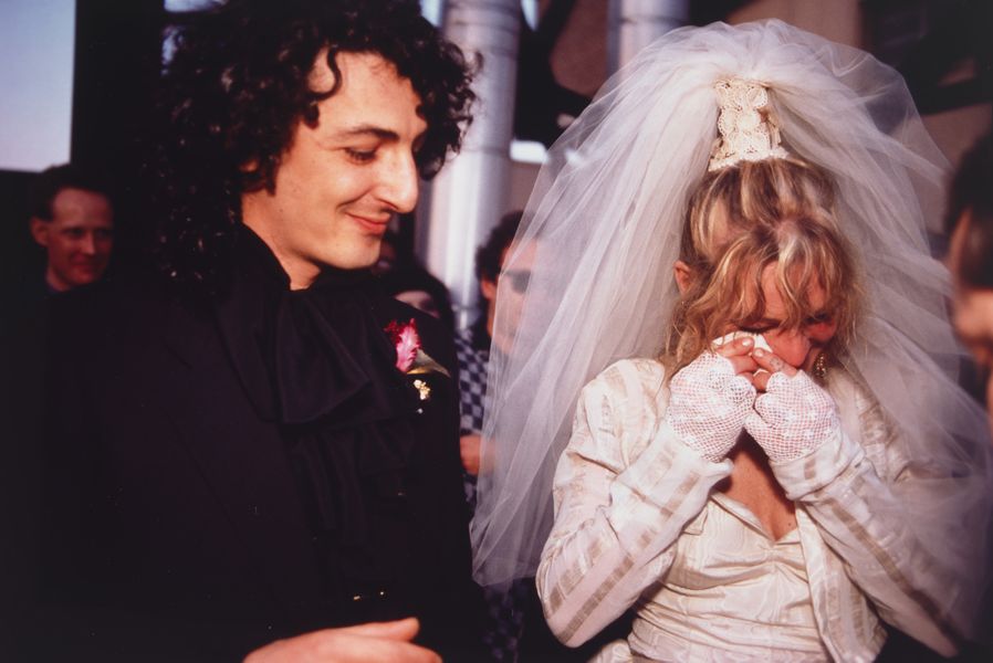 Friends of artist Nan Goldin pictured at their wedding.