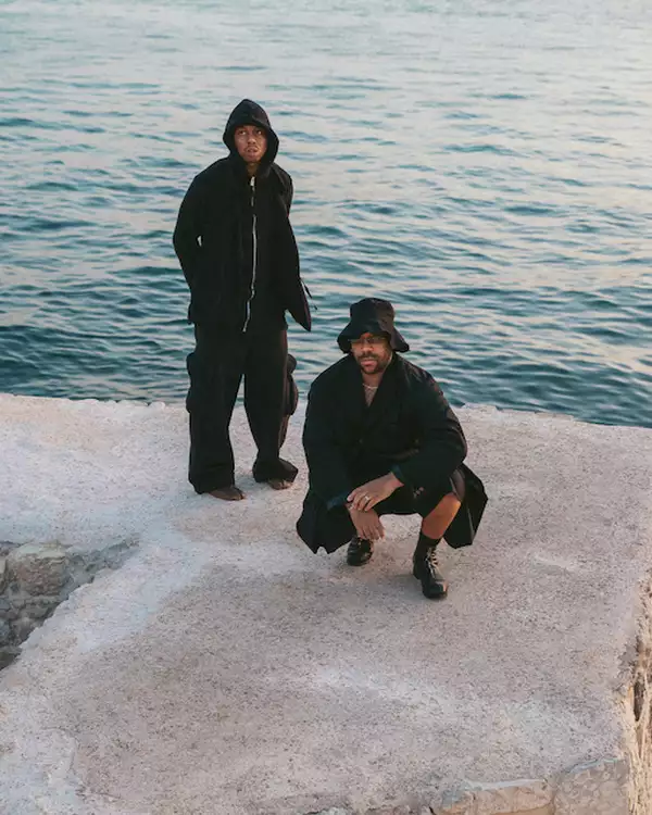 Space Afrika stood next to the ocean