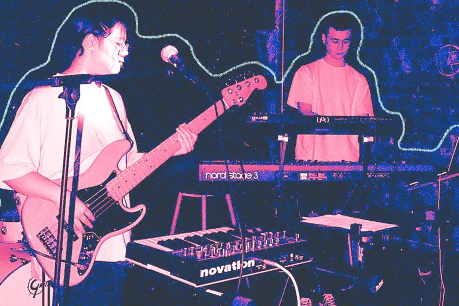 members of the band perform in a nightclub