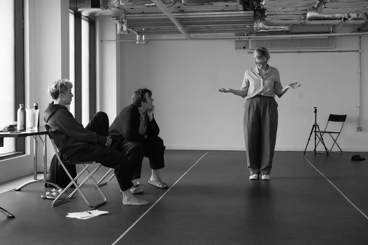 Black and white photograph of Maxine Peake rehearsing They