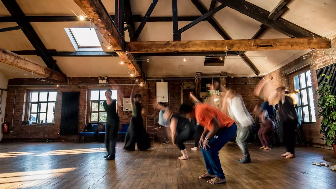 Blurry photo of people dancing