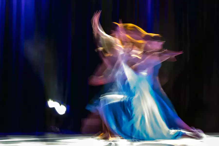 Photograph of two dancers on stage