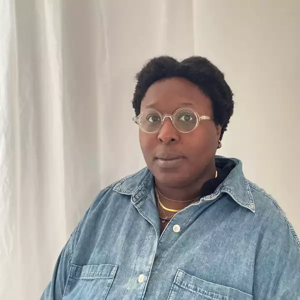 Headshot of flematu sessay on a white background