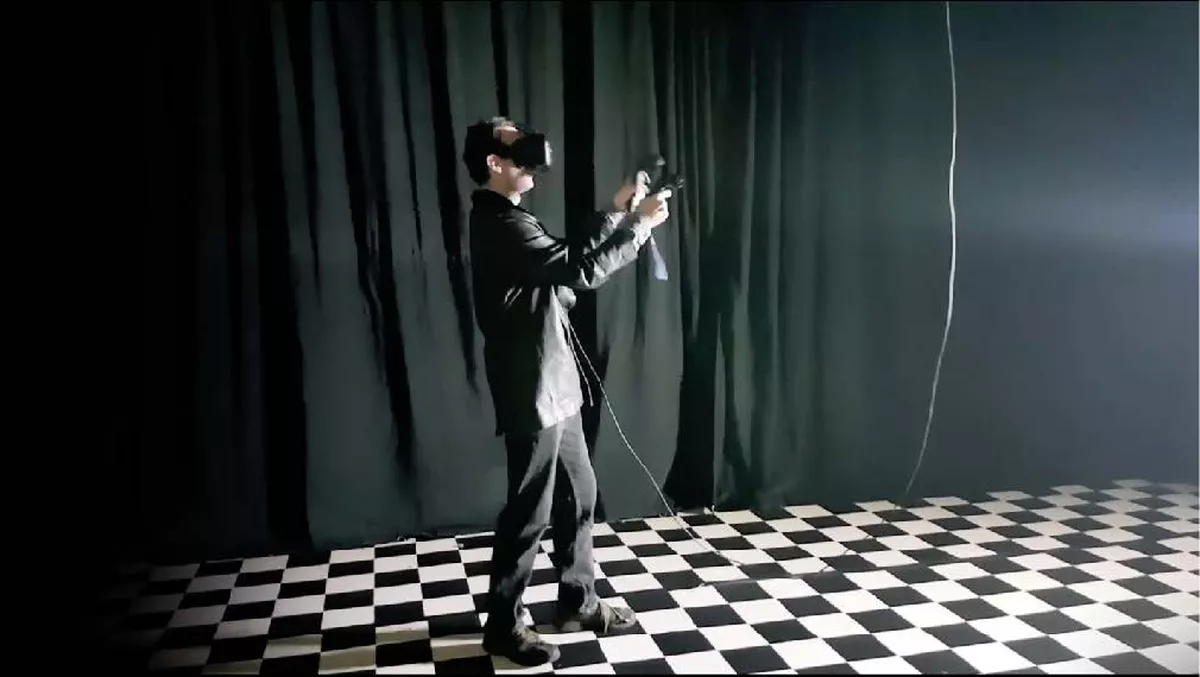 Someone operating a virtual reality headset.