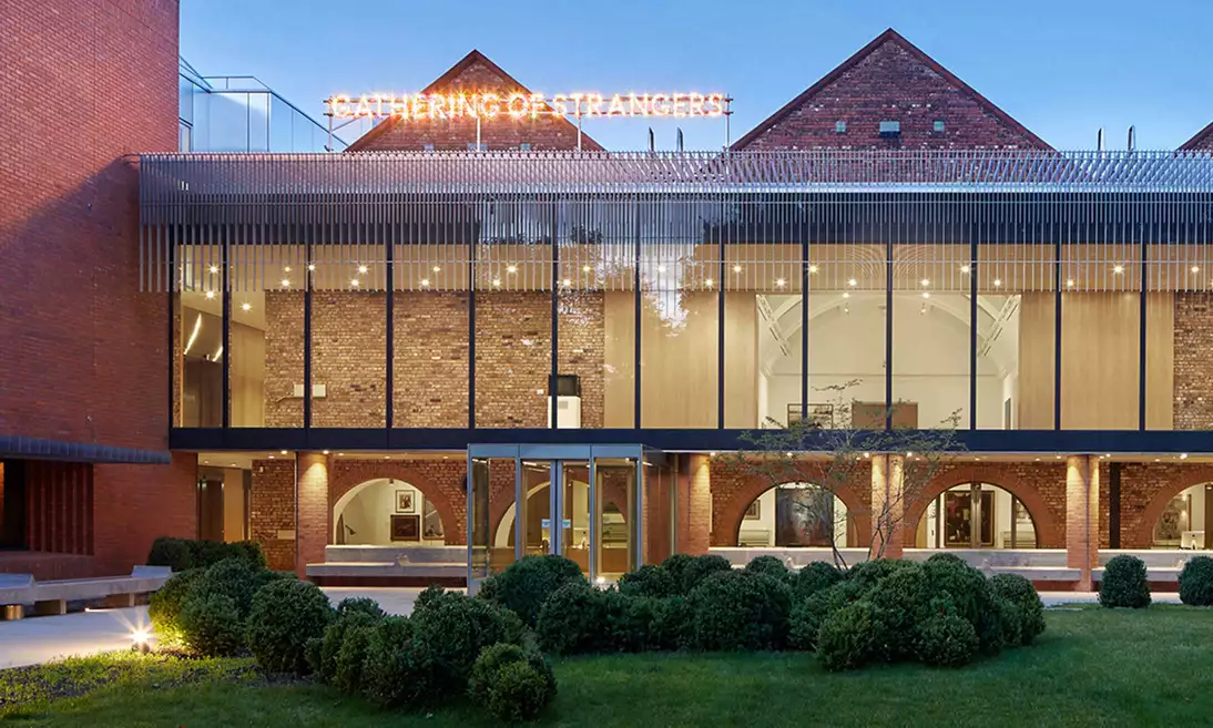 The exterior of the Whitworth Art Gallery photographed with gardens in the forefront