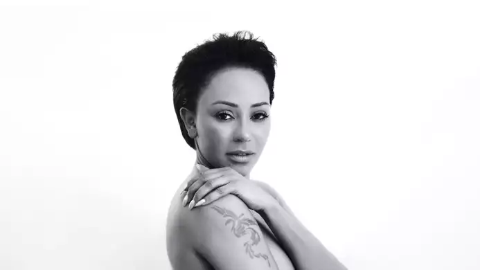 Headshot of Mel B on a white background