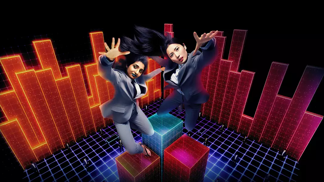 Two people in suits jumping in the air on a lit-up background