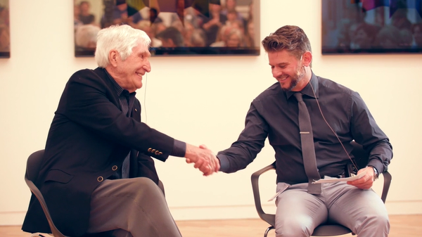 Photo of Nick Mitzevich shaking hands with Kenneth Tyler