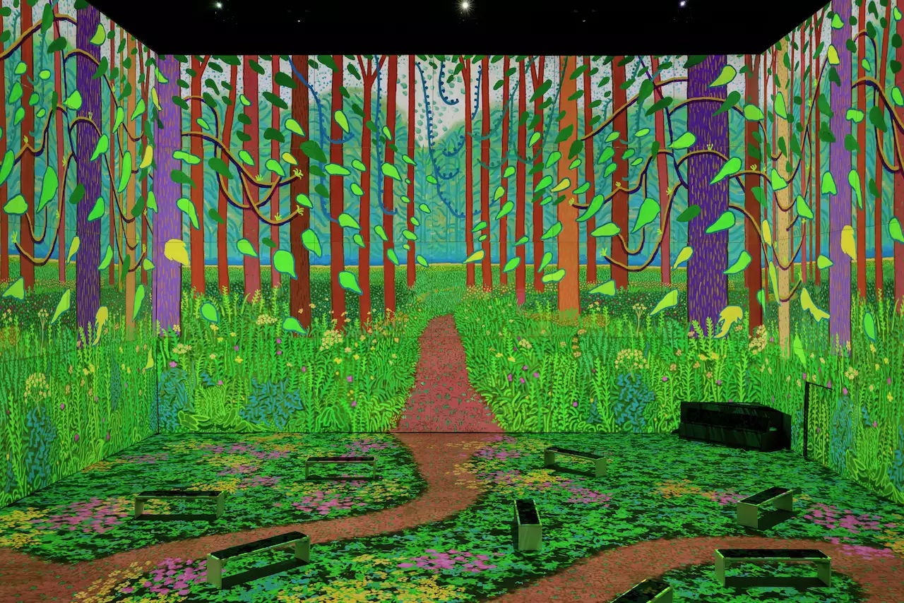 An image from David Hockney: Bigger & Closer (not smaller & further away), showing 'The Arrival of Spring in Woldgate' in the exhibition, which is empty