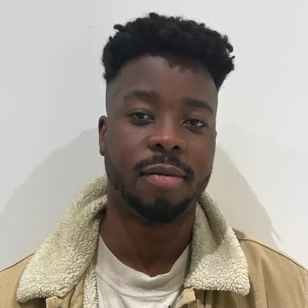 Headshot of Solomon Hughes