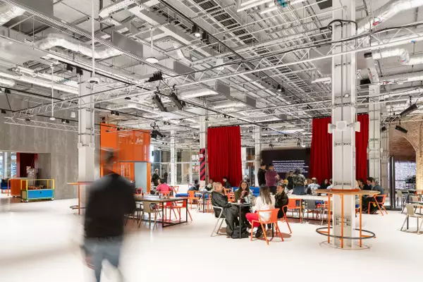 Photo of visitors sat down in the Social