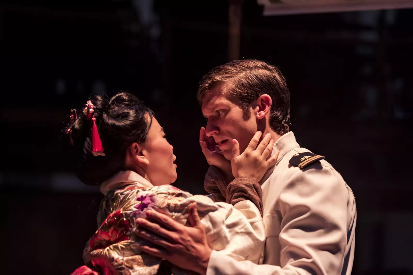 Photo of two people looking into each others' eyes