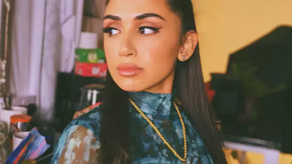 portrait of Hana Malik - candid shot of her looking away from camera