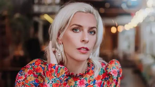 Headshot of Sara Pascoe wearing a floral top