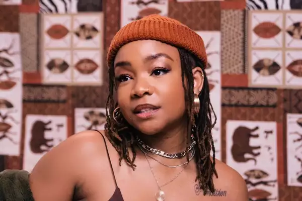 Artist Lebo wearing a beanie hat