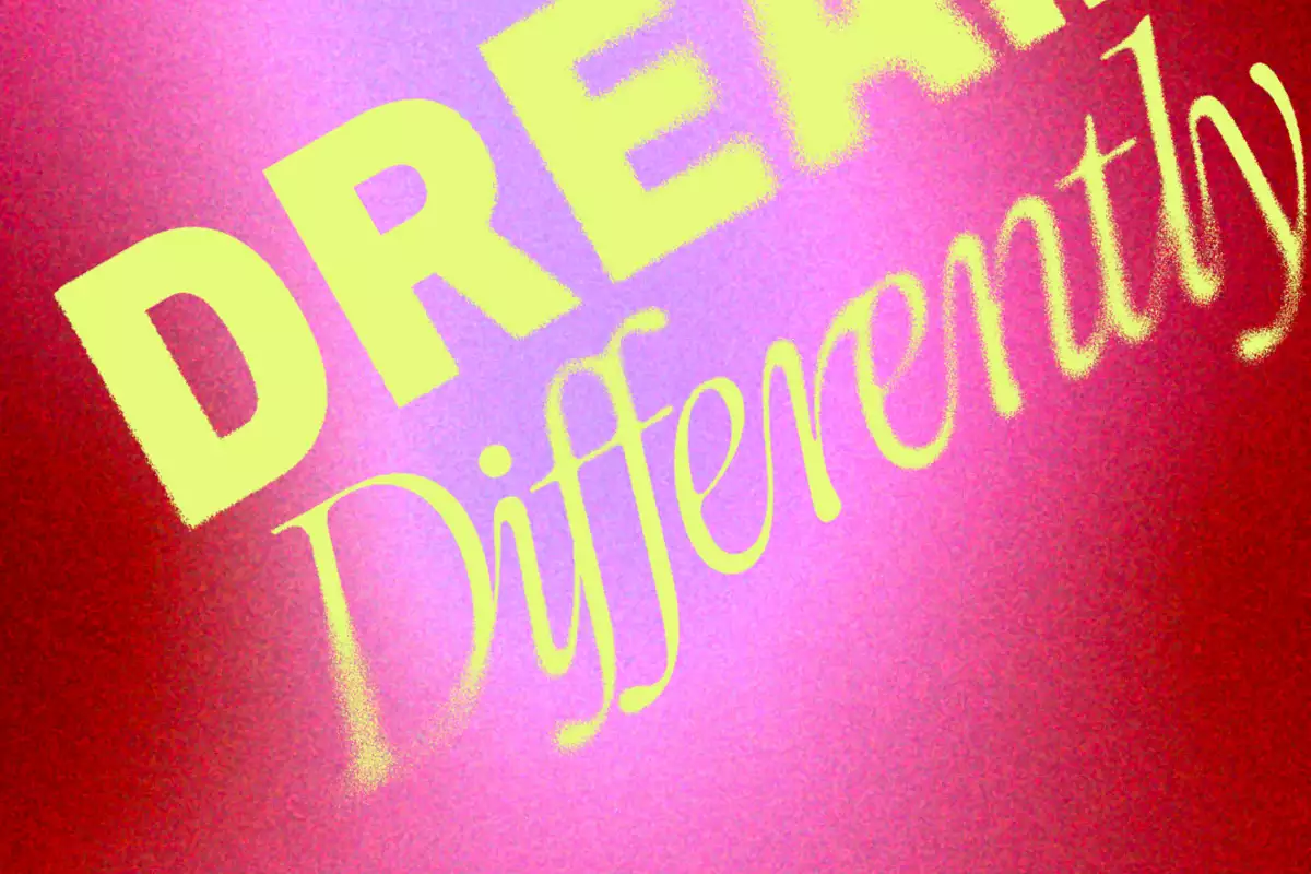 A bold, artistic graphic with the words "DREAM Differently" in yellow text against a red and pink gradient background with a grainy texture.